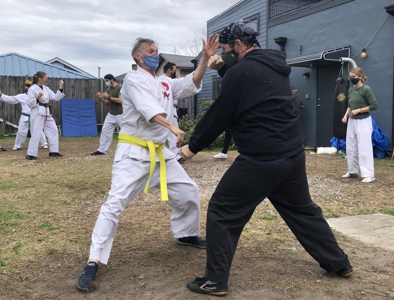 Liam and David practice light sparring.